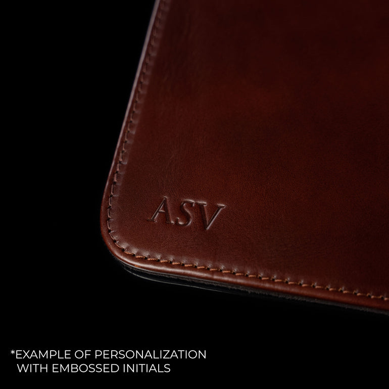 example of personalization on leather mat with embossed initials asv
