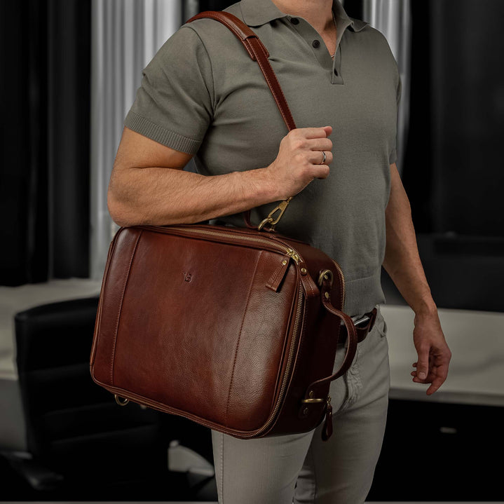 Von Baer 10x luxury leather laptop travel bag/briefcase with strap in brown, used in the office.