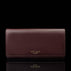 Von Baer Allure large burgundy full-grain leather accordion wallet with RFID protection and gold-tone branding, shown in a front view against a black background.