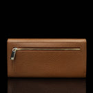 Von Baer Allure large cognac tan full-grain leather accordion wallet with RFID protection, shown in a back view highlighting the zipped outer pocket with a gold-tone zipper against a black background.