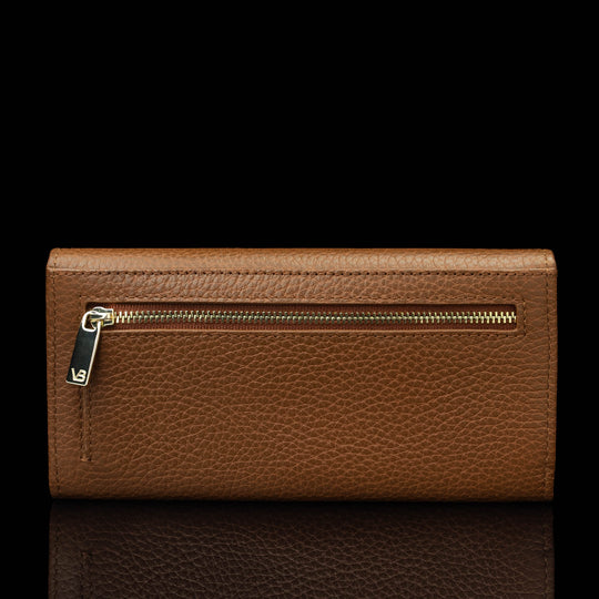 Von Baer Allure large cognac tan full-grain leather accordion wallet with RFID protection, shown in a back view highlighting the zipped outer pocket with a gold-tone zipper against a black background.