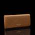 Von Baer Allure large cognac tan full-grain leather accordion wallet with RFID protection and gold-tone branding, displayed in a half-turned view against a black background.