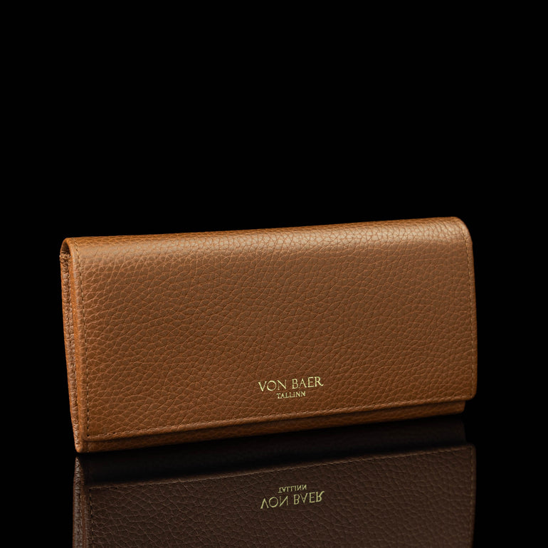Von Baer Allure large cognac tan full-grain leather accordion wallet with RFID protection and gold-tone branding, displayed in a half-turned view against a black background.