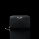 Von Baer Celeste small black full-grain leather zip-around wallet with gold-tone branding, displayed in a front view against a black background.