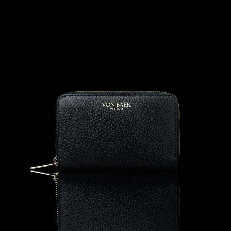 Von Baer Celeste small black full-grain leather zip-around wallet with gold-tone branding, displayed in a front view against a black background.
