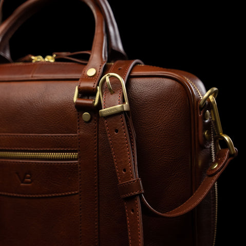 Von Baer City brown color business premium leather laptop bag for women featuring an adjustable shoulder strap close-up.