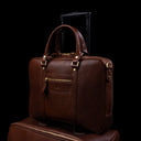 on Baer City leather laptop bag for travel with a luggage strap on trolley luggage