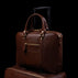 on Baer City leather laptop bag for travel with a luggage strap on trolley luggage