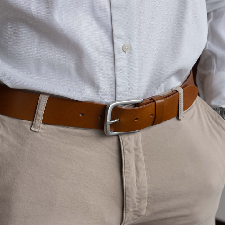 Von Baer classic luxury full-grain leather belt for men in tan, with a stainless steel buckle.