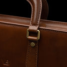 Men’s Von Baer Elegant high-quality slim full-grain leather laptop bag in brown, featuring solid brass hardware.