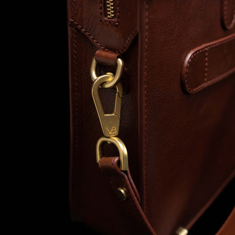 Men’s Von Baer Elegant luxury slim full-grain leather laptop bag in brown, featuring a removable shoulder strap.