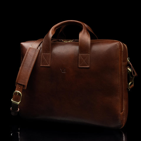 von baer essential luxurious italian leather briefcase for men solid brown half side view with shoulder strap