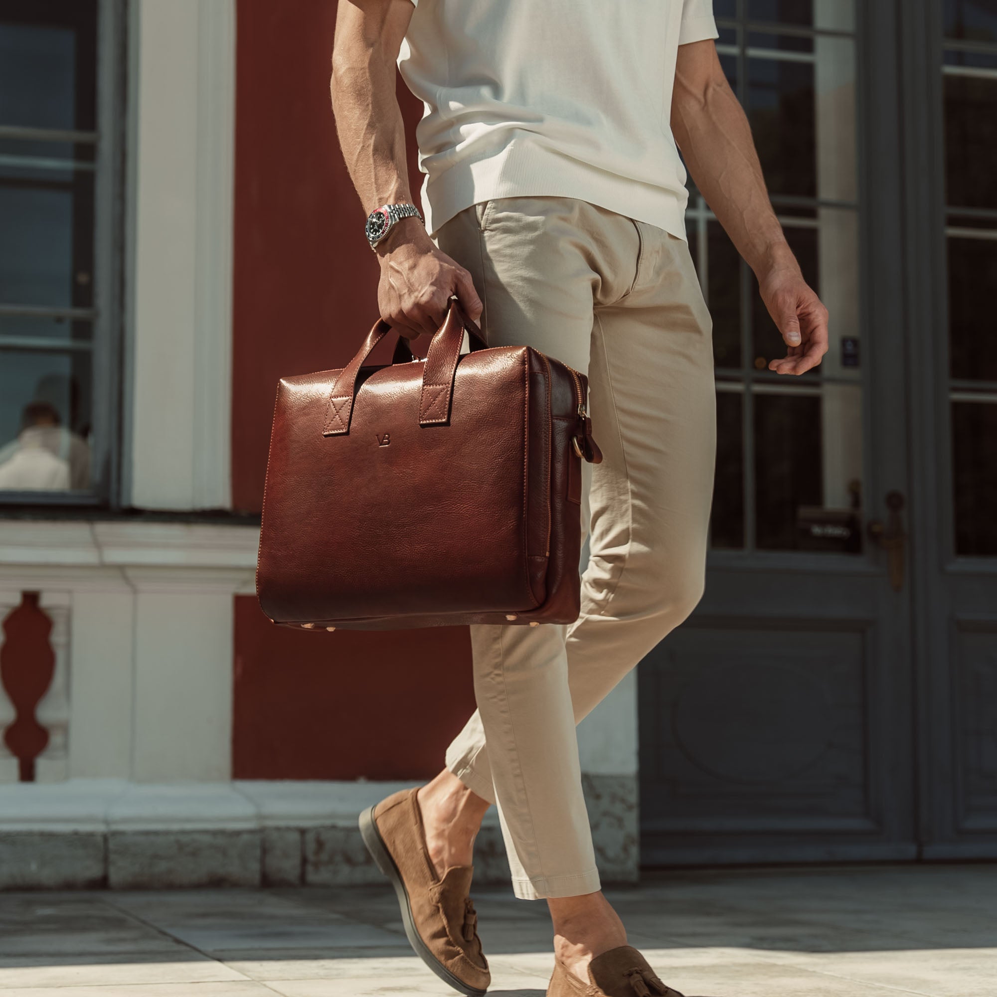 von baer essential modern high quality leather briefcase brown luxury style in hands of good looking man