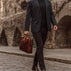 von baer essential modern professional italian mens leather briefcase for laptop solid brown with good looking man in a suit