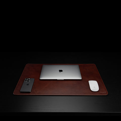 Von Baer Executive high-quality medium size luxury leather desk mat in brown color, featuring a front view with a MacBook.