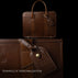 An exquisite Von Baer leather laptop bag showing an example of personalization with embossed initials on the attached luggage tag.