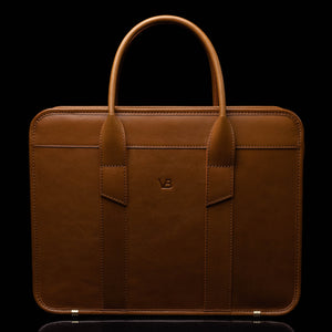 Von Baer Exquisite luxury full-grain leather laptop briefcase for work in tan, front view for women.