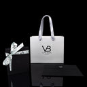 Von Baer gift packaging with leather wallets for men, neatly presented in an elegant box.