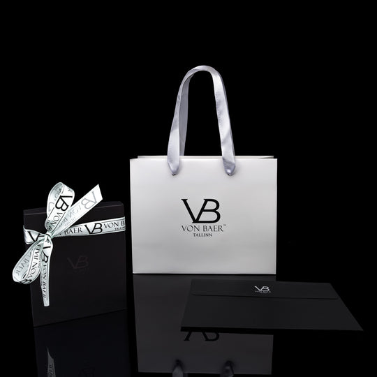 Von Baer gift packaging with leather wallets for men, neatly presented in an elegant box.