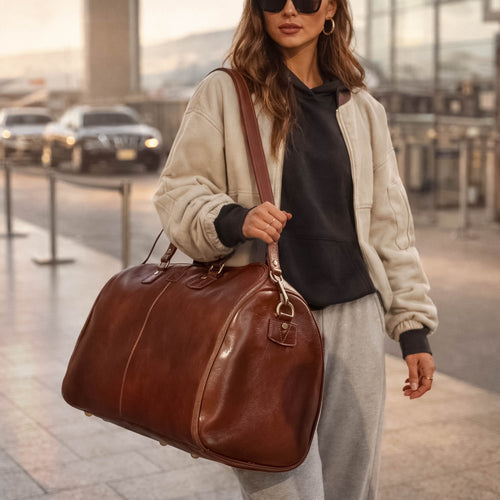 best women's duffel bag for travel Womens bags, weekender carry on women, sports Gym Bag, workout bag, overnight shoulder fit 15.6 inch Laptop Pink Large Handcrafted in Northern Italy by experienced craftsmen in family BAGSMART Foldable Travel Duffle Bag