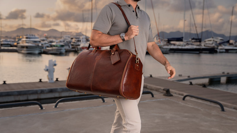 Von Baer Grand Large Full-Grain Leather Garment Travel Bag (Brown, Man Wearing, Sunset Marina)