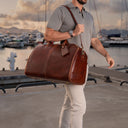 Von Baer Grand Large Full-Grain Leather Garment Travel Bag (Man Wearing, Sunset Marina, Luxury Yachts)