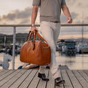 Von Baer Grand Large Full-Grain Leather Garment Travel Bag (Tan, Luxury, Man Carrying, Sunset)
