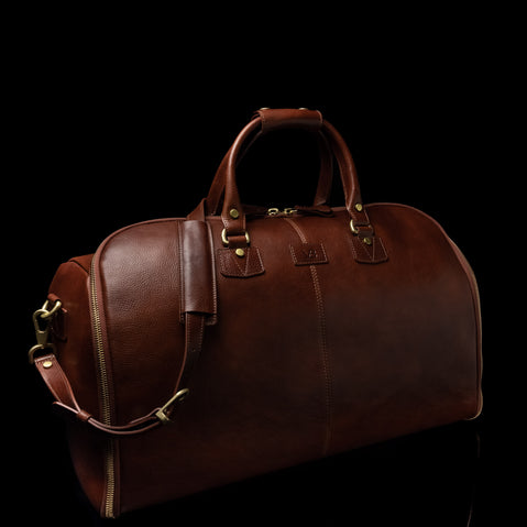 the grand in brown showing the shoulder strap attached to the side