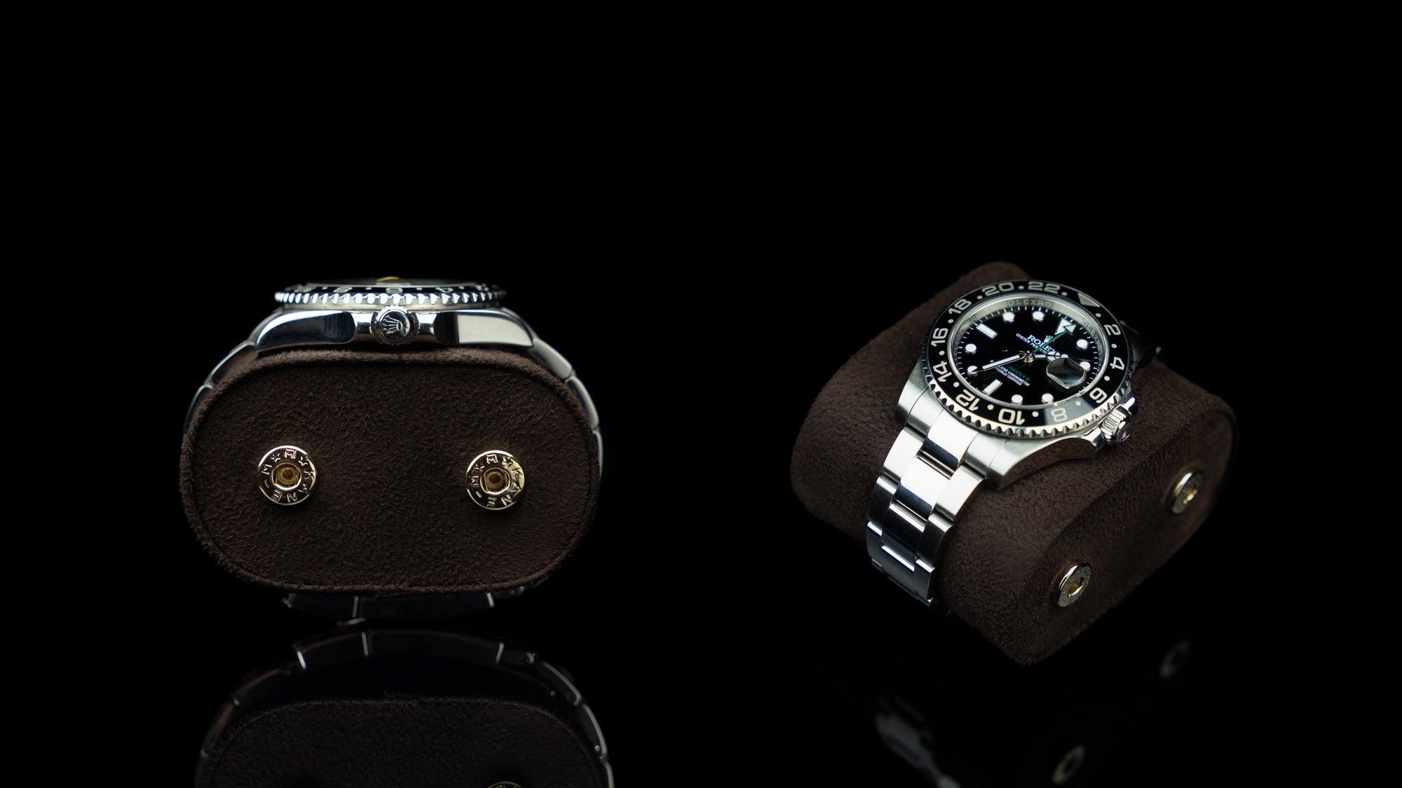 Front view of a brown Von Baer Hamilton luxury leather watch roll, showing the detachable cushion with a Rolex watch.
