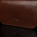 Von Baer Isabella luxury small full-grain leather shoulder bag with adjustable strap in brown, featuring the Von Baer logo.