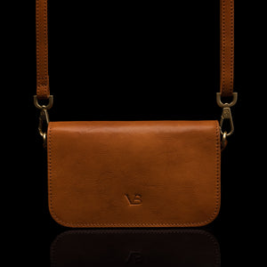 Von Baer Isabella luxury small leather shoulder bag with adjustable strap in tan, front view.