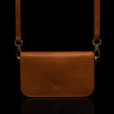 Von Baer Isabella luxury small leather shoulder bag with adjustable strap in tan, front view.