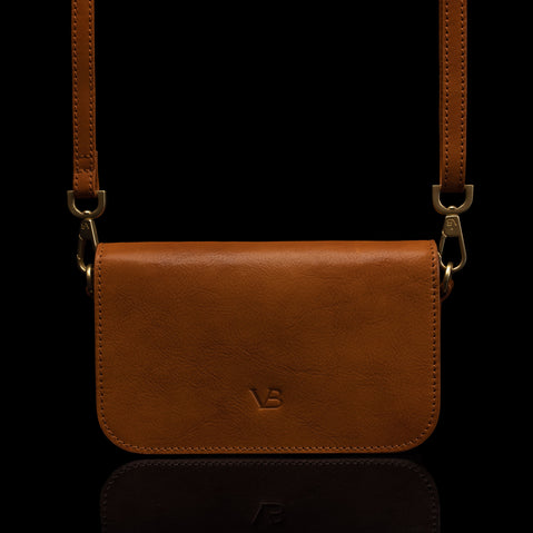 Von Baer Isabella luxury small leather shoulder bag with adjustable strap in tan, front view.