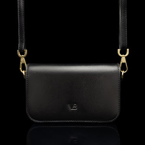 Von Baer Isabella small leather shoulder bag with adjustable strap in black, front view.