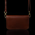 Von Baer Isabella small leather shoulder bag with adjustable strap in brown, back view.