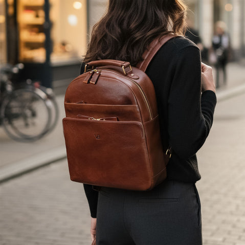 Von Baer Liberty full-grain leather backpack for women in the city street, stylish backpack for work and travel.
