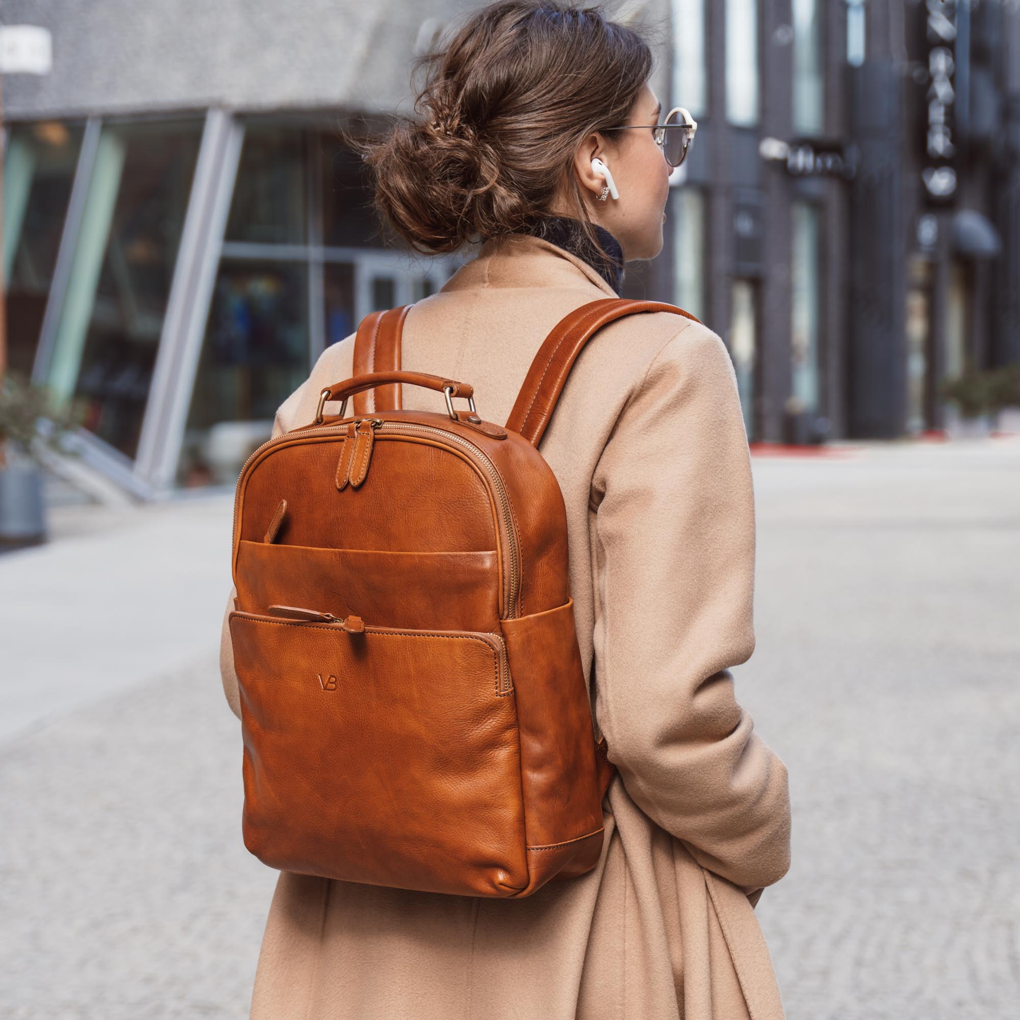 Leather backpack companies best sale