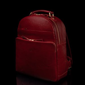 Von Baer Liberty women's vegetable-tanned leather backpack in red, front view, highlighting its sleek and stylish design.