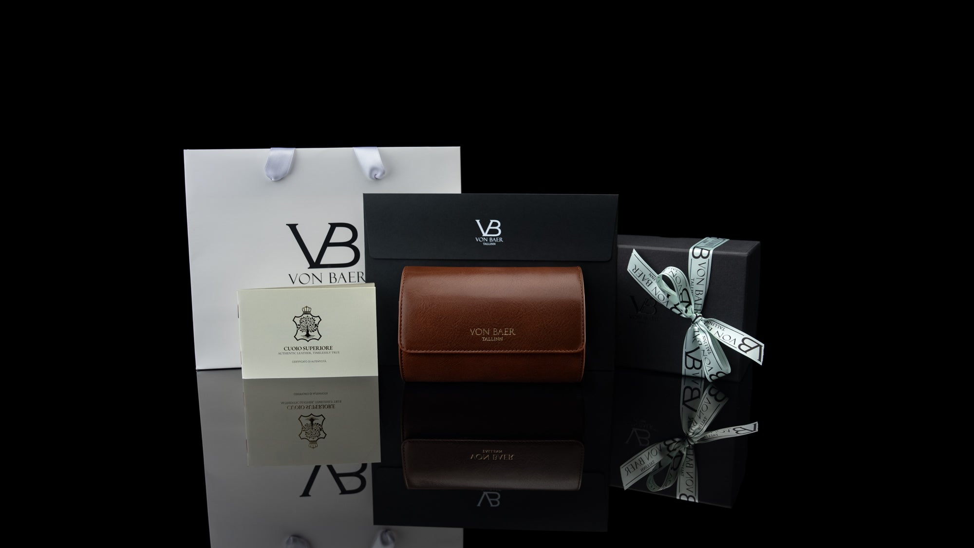 A brown Von Baer luxury leather watch roll in its gift packaging, ready to be gifted.
