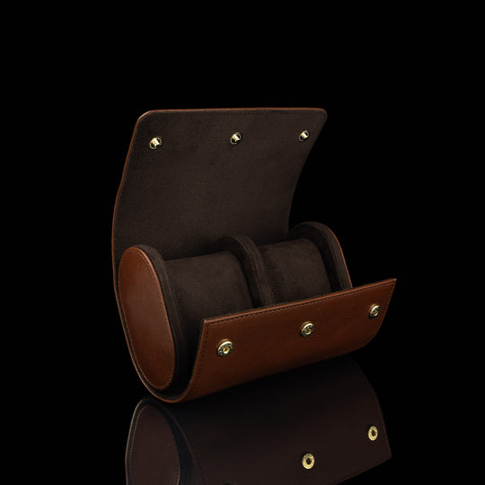 An inside view of an open brown Von Baer luxury leather watch roll.