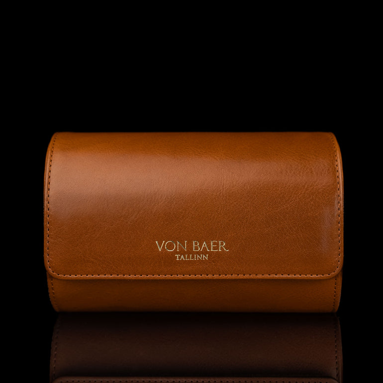 A front view of a tan Von Baer luxury leather watch roll.