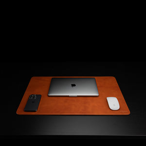 Von Baer Executive medium luxury leather desk mat in tan color, featuring a front view with a MacBook, ideal as a gift.