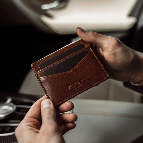 von baer minimalist best quality mens slim leather card holder brown in the luxurious car