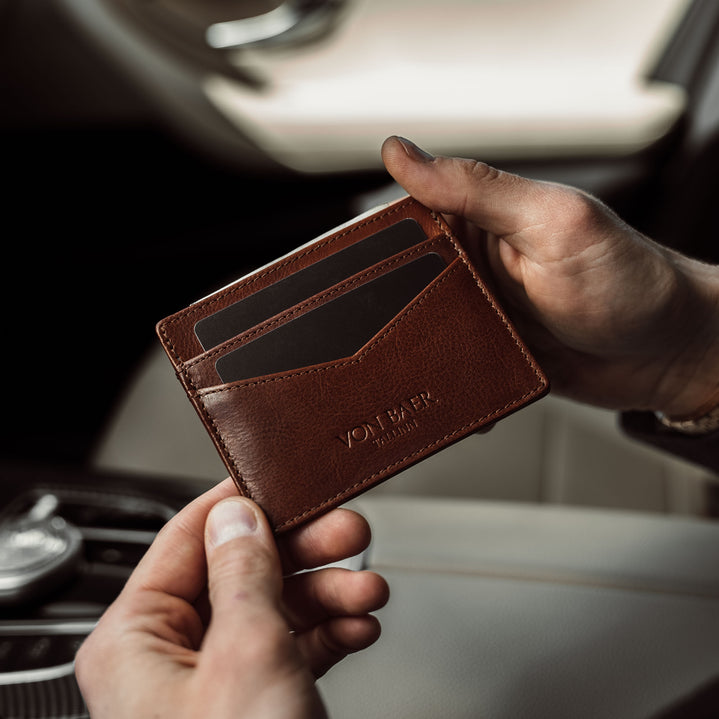 von baer minimalist best quality mens slim leather card holder brown in the luxurious car