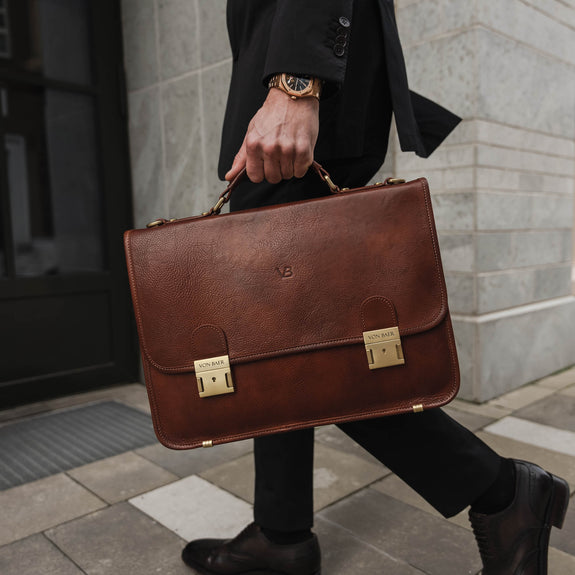 von baer no 2 high quality secure leather messenger briefcase for businessmen carried by male model