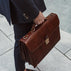 top view of no.1 briefcase carried by male model