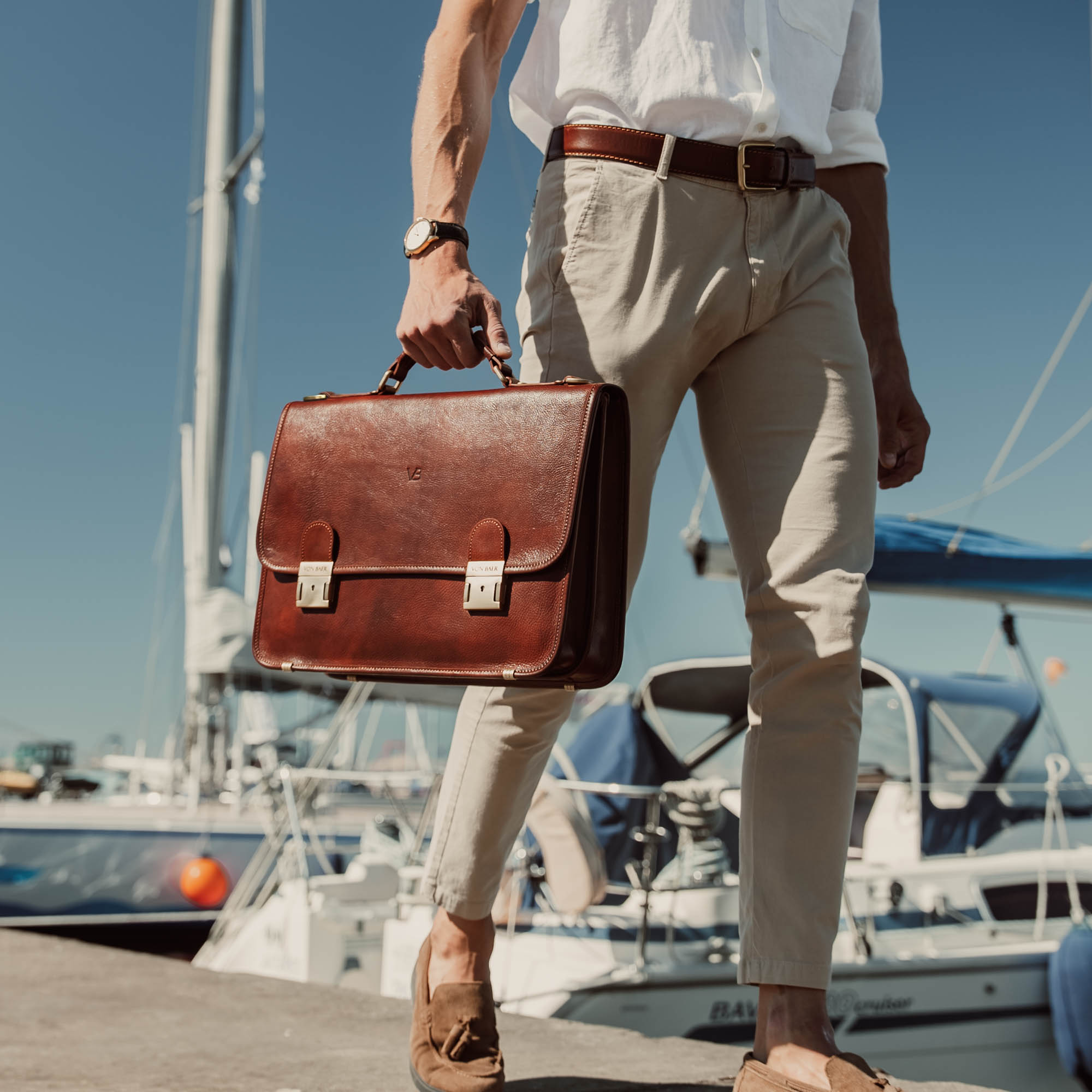 von baer no2 luxury leather messenger briefcase brown carried by businessman in harbour