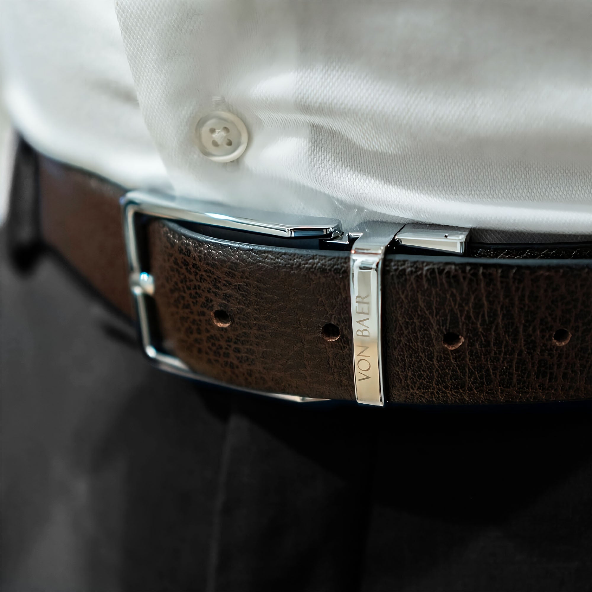 von baer premier luxury reversible natural leather belt black and brown on male model silver buckle