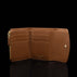 Von Baer Reverie cognac pebbled leather women's wallet, shown open against a black background to highlight multiple card slots, a zippered pocket, and elegant gold-tone hardware