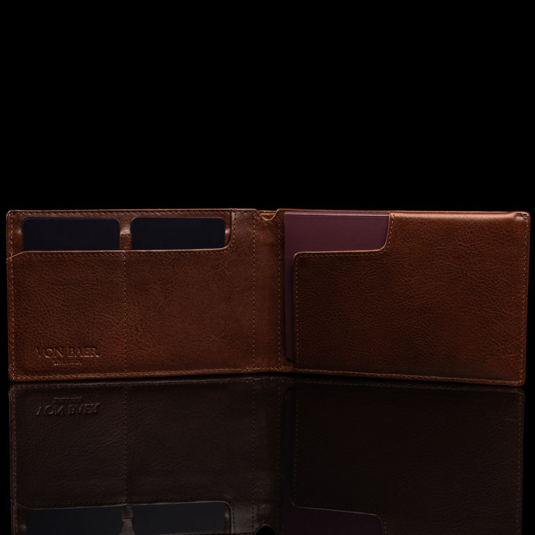 von baer slim leather passport holder travel rfid wallet brown front view filled with cards and passport